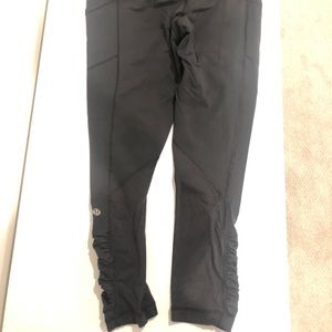 Classic black Lululemon crops with ruffles